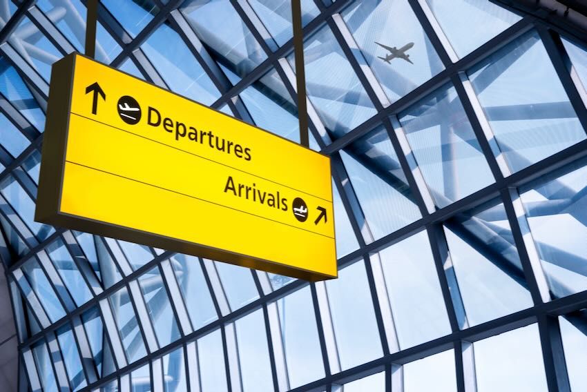 Airports arrivals and departures sign